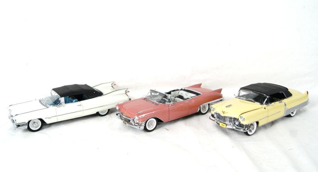 Collection of 3 Danbury Mint Cadillacs - 50th Anni: anniversary Edition 59 Cadillac series 62 convertible, 57 Cadillac Eldorado Biarritz and 54 Cadillac Eldorado
