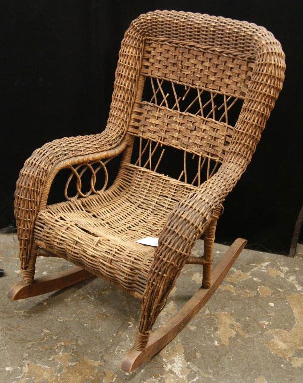 23 Antique Child's wicker rocker