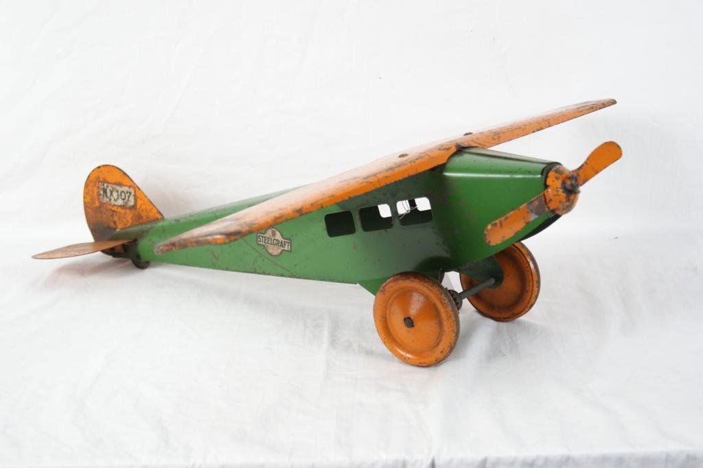 vintage pressed steel toy airplanes