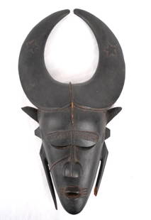 West African Senufo Dance mask w horns & stars: Wood carved, Ebony painted, dance mask measures 16.5" x 8.5" x 3"