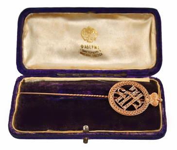 A Romanov Owned Karl Faberge Gold & Diamond Pin: A 14kt Rose Gold Karl Faberge Pin Owned by the House of Romanov Grand Duke Sergei Mikhailovich (1869-1918) of Russia. The Pin is marked KP and 56 and features a round wreath motif with a crown atop di