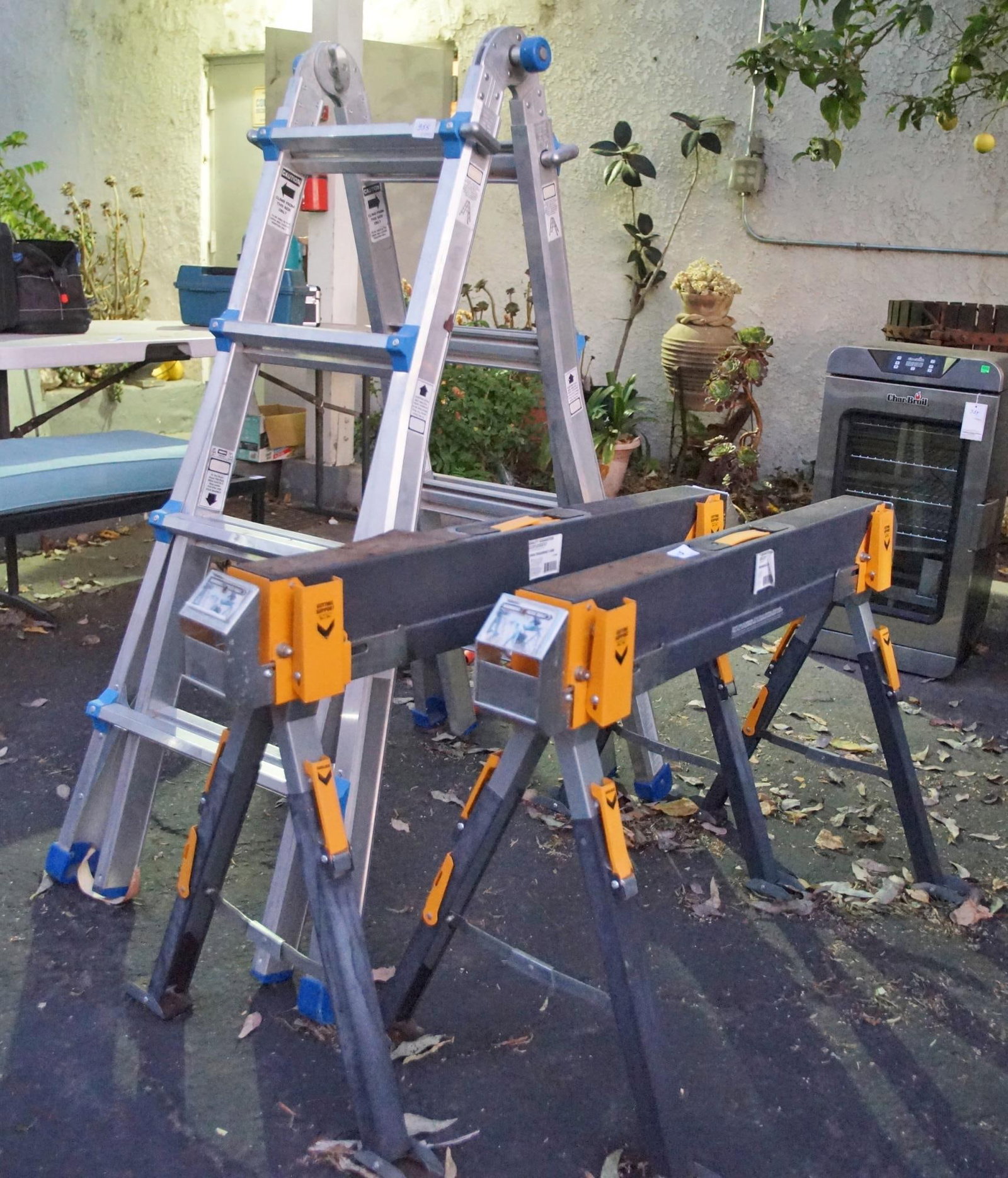 Toprung Ladder and 2 Toughbuilt Saw horses: 3 pcs 17 ft multi 4 step position extension ladder plus two saw horses