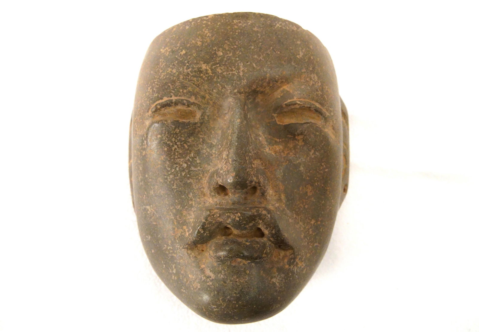 Olmec (900–500 B.C) Green Stone Mask with letter: Olmec (1200–400 BC) Green Stone Mask from Veracruz, Mexico. A particularly aesthetic example, Rio Pesquero type mask, carved without metal tools, using stone and obsidian to cut, and jade or quartz 