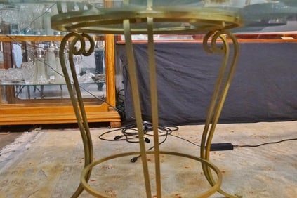 Glass dining table with wrought Iron base