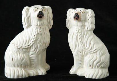 Pair of antique Staffordshire dogs