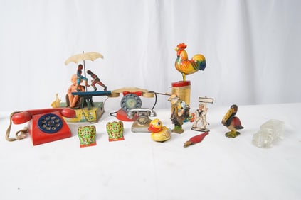 14 Vintage toys - includes child w umbrella