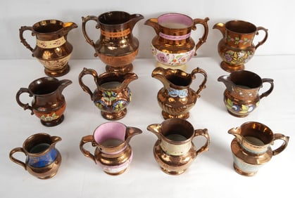 Collection of Antique 11 lusterware pitchers