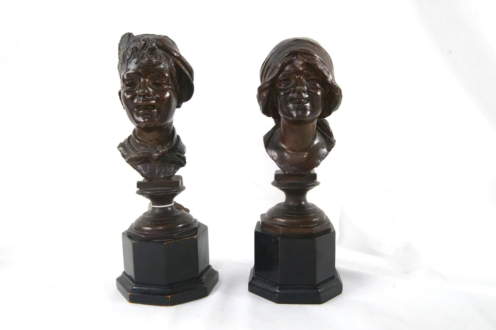Gaetano Chiaramonte (1872-1962) Bronze busts: Young Bow and Girl ca 1870 artist signed Gaetano Chiaramonte (1872-1962, Italy) - Italian peasant pair measure approx. 6" -6.5" and 8.5" and 9" on wood carved base bottom show very old nut