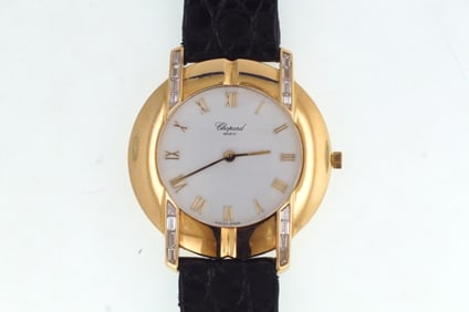 18kt Gold Chopard watch with baguette diamonds