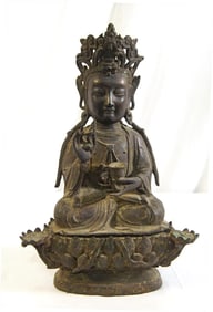 A gilt lacquered bronze seated Guanyin, Ming Dyn