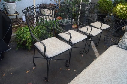 Set of 4 ornate wrought iron patio chairs