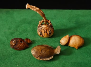 Collection of four antique Japanese Carvings