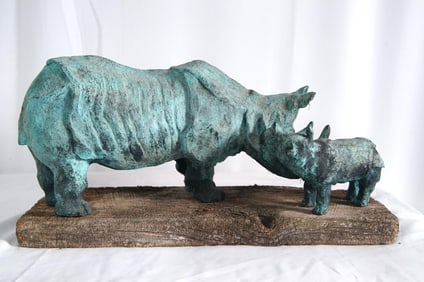 Bronze Rhinoceros Mother & Child on board