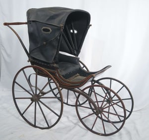Antique baby carriage w wooden wheels