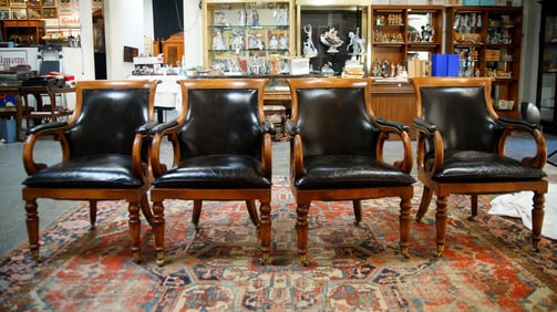 Set of Four Vintage rolling Club Chairs