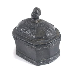 Antique round LEAD box w Nubian head