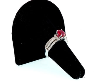 18kt white gold oval ruby and diamond ring