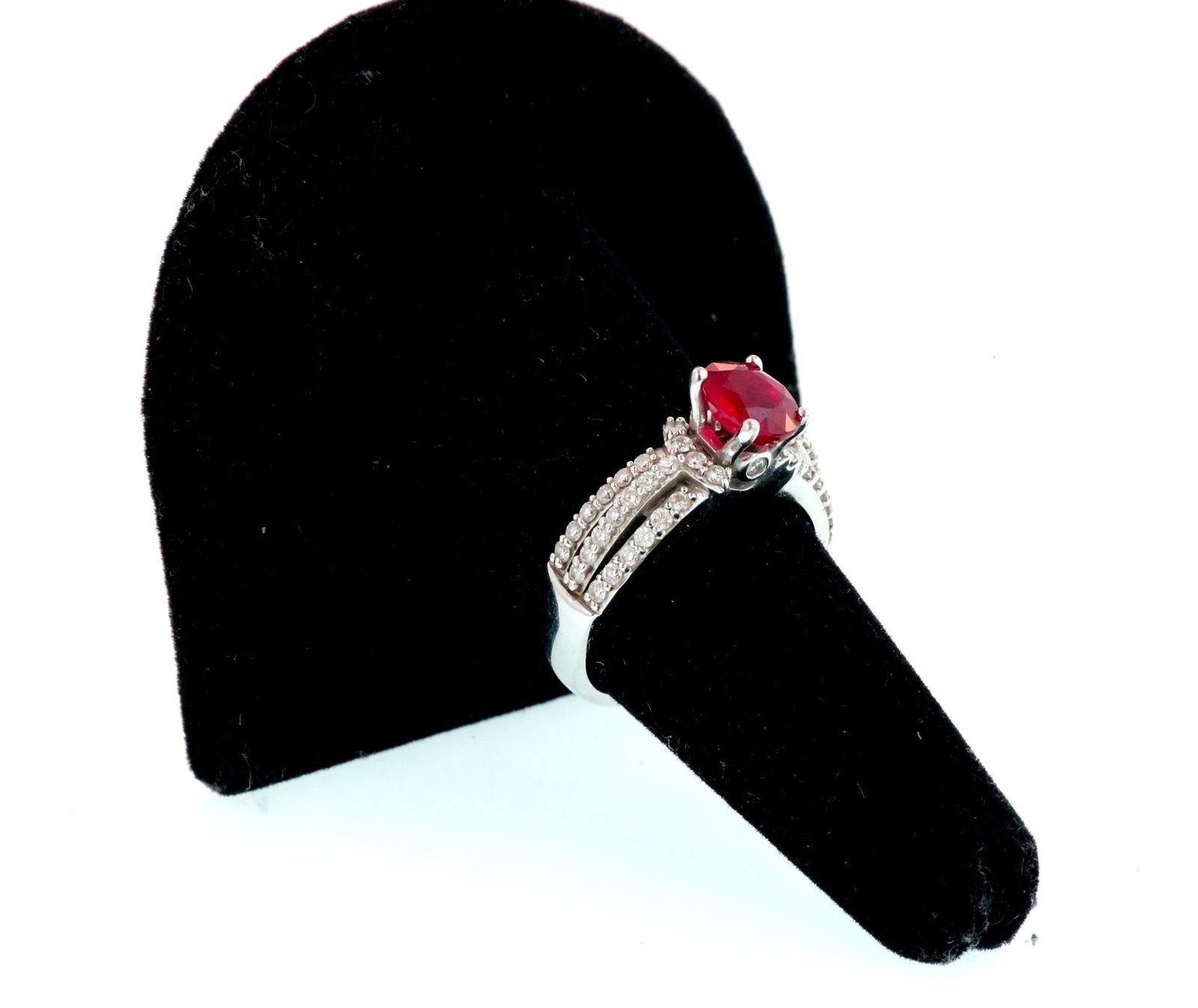 18kt white gold oval ruby and diamond ring