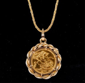 1979 Elizabeth II Gold Sovereign with gold bezel