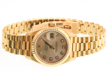 18kt Gold Ladies Rolex DateJust with diamonds