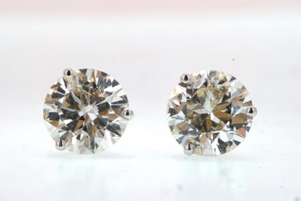 Pair 14kt gold 4.17 ctw diamond stud earrings