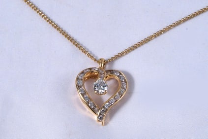 14kt Gold 3.21ctw Diamond Heart Pendant
