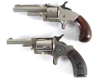 Two antique .32 Spur trigger revolvers
