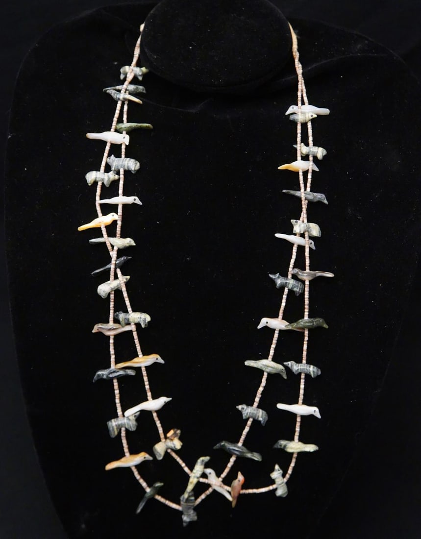 Zuni Fetish necklaces with birds: Shell beaded necklaces with repeating hand carved stone bird fetishes Provenance: The collection of Peter and Mary Newman, Westlake and Ojai California