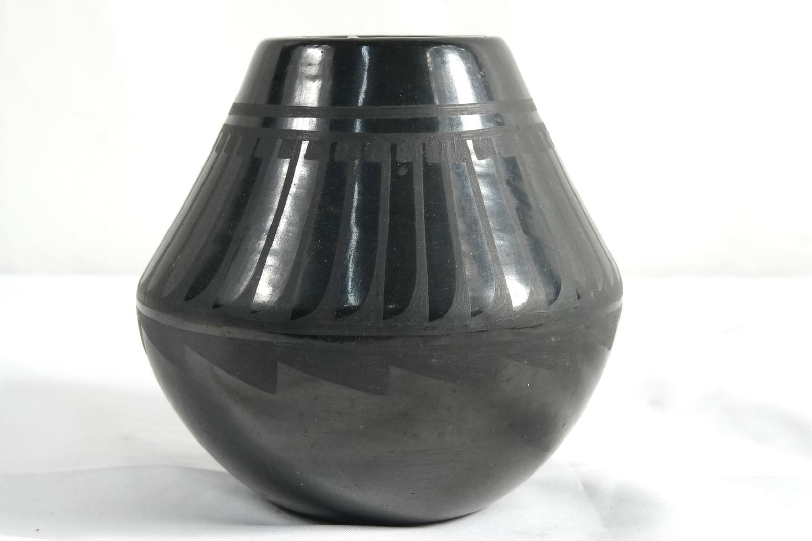 Blue Corn Blackware San Ildefonso bowl: and small turtle