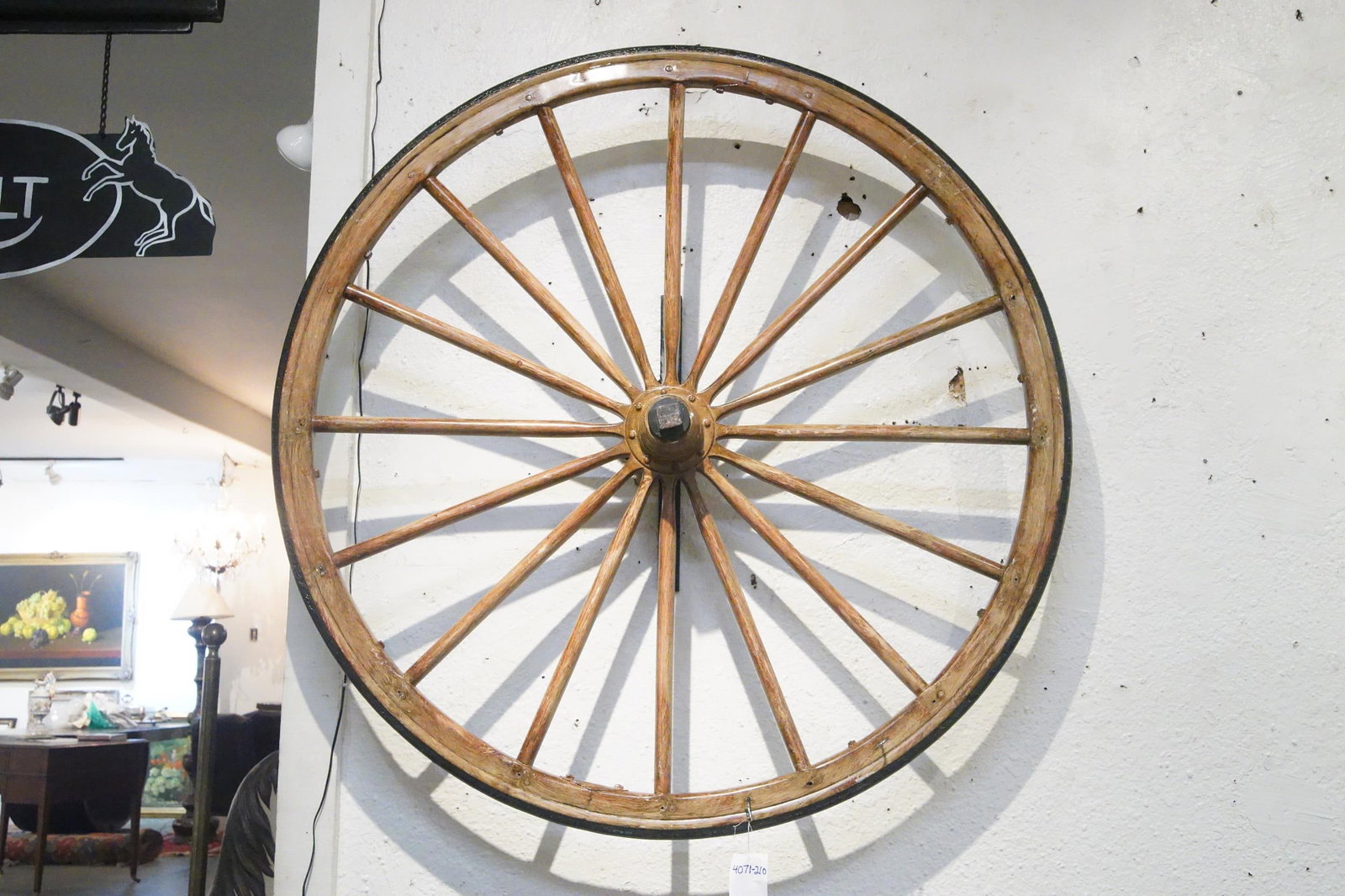 Wall mount wagon wheel display: 44" diam - Provenance: Museum of the Cowboy "Jim Grimm estate" Solvang Ca.