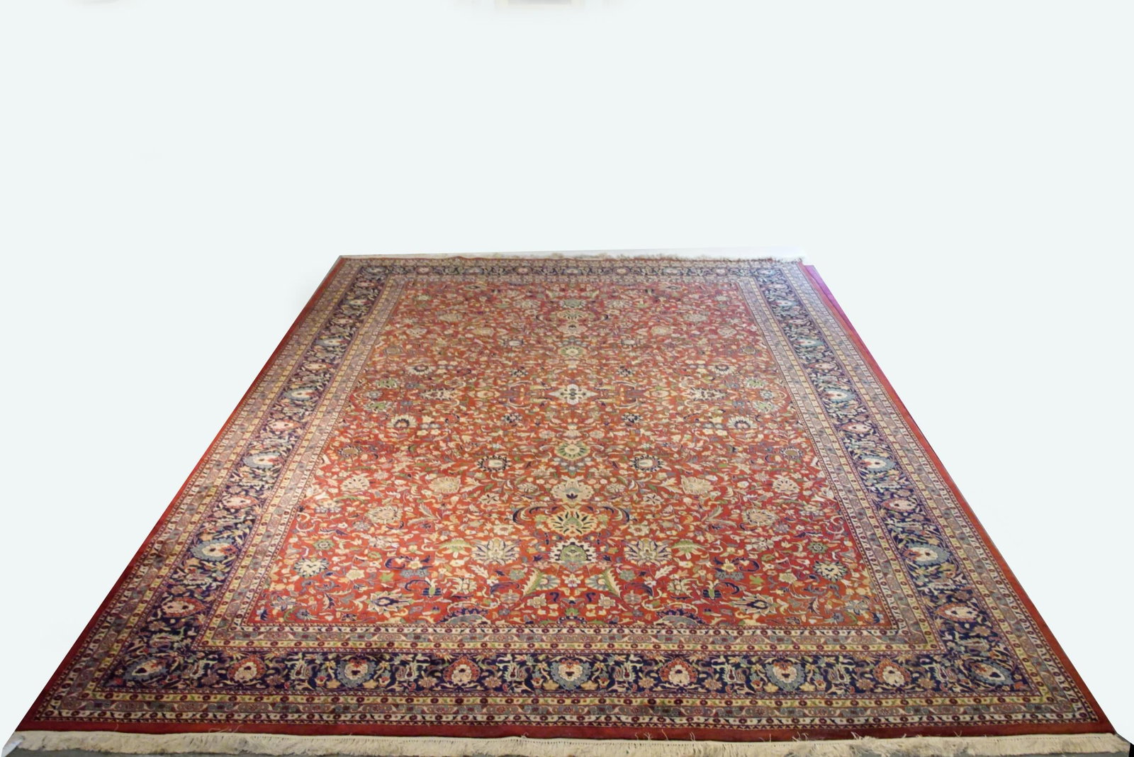 Rare Kashan Persian Rug 15' x 12': Persian Kashan rug, featuring an intricate all-over scatter-blossom pattern with a deep red purplish ground and navy blue border, along with a number of colors decorated with palm florettes, vining