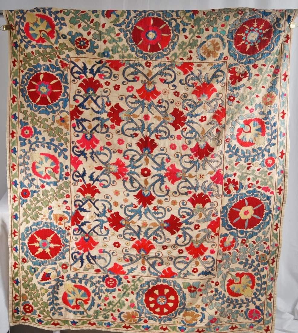 Suzani Nurata hand silk textile: Uzbek - very colorful flowers measures 47" x 58" Hand Embroidered & stitched Silk Provenance: The Collection of Ruth Newman to her children the Estate of Peter and Mary Newman.