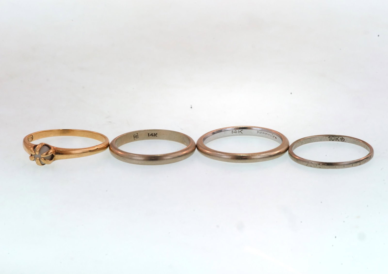 Four Vintage Gold Rings - 7 gms: size 7.5 marked 14kt Gold and 10 kt gold