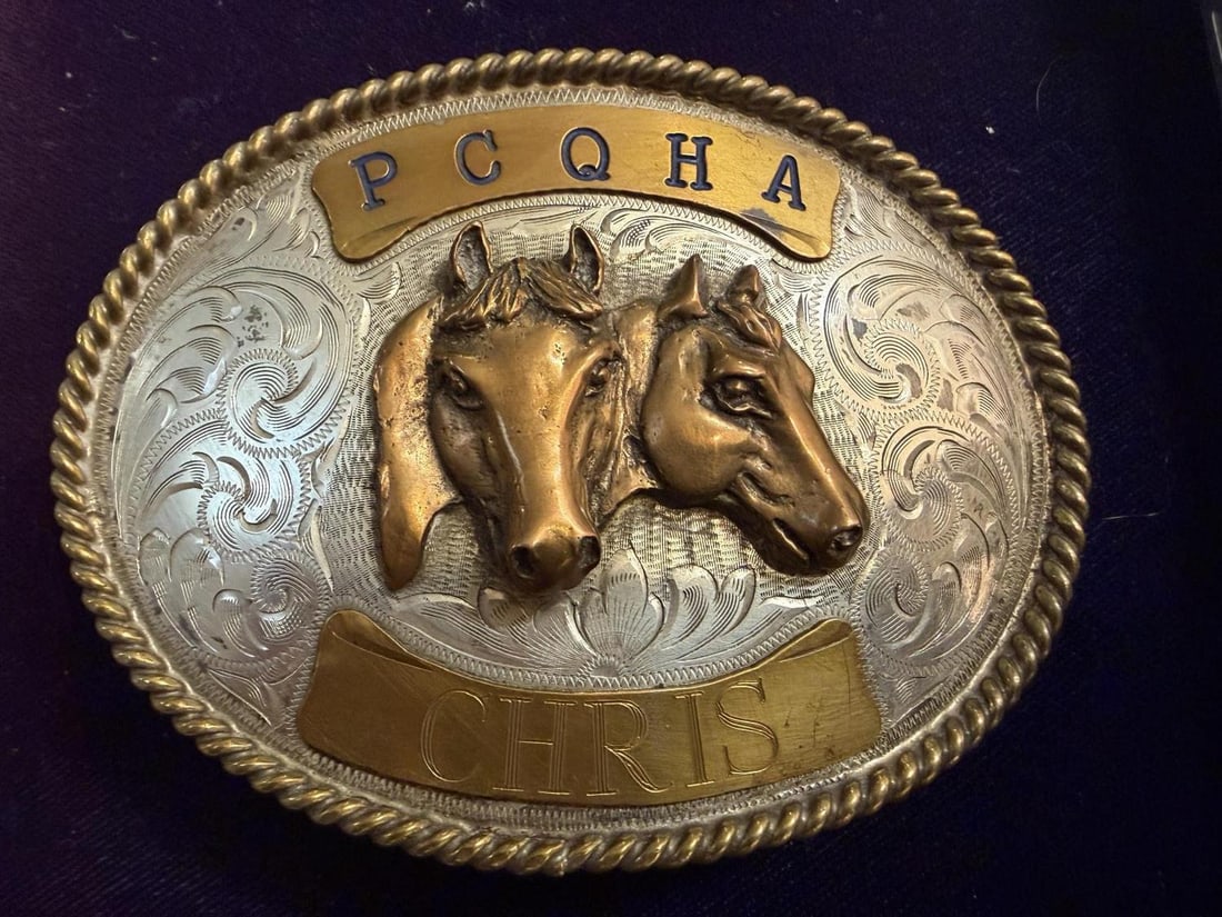 Three Sterling silver rodeo buckles - 14