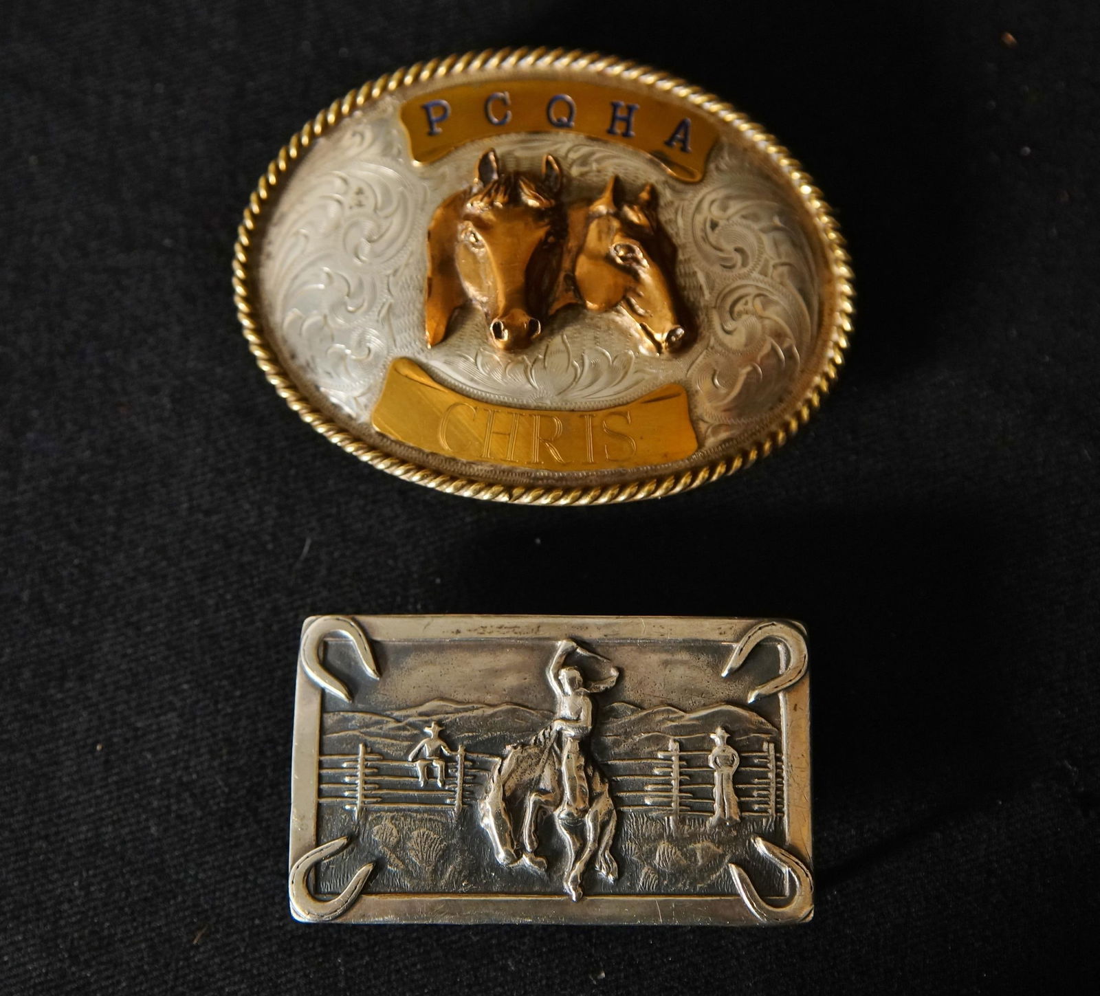 Three Sterling silver rodeo buckles - 16