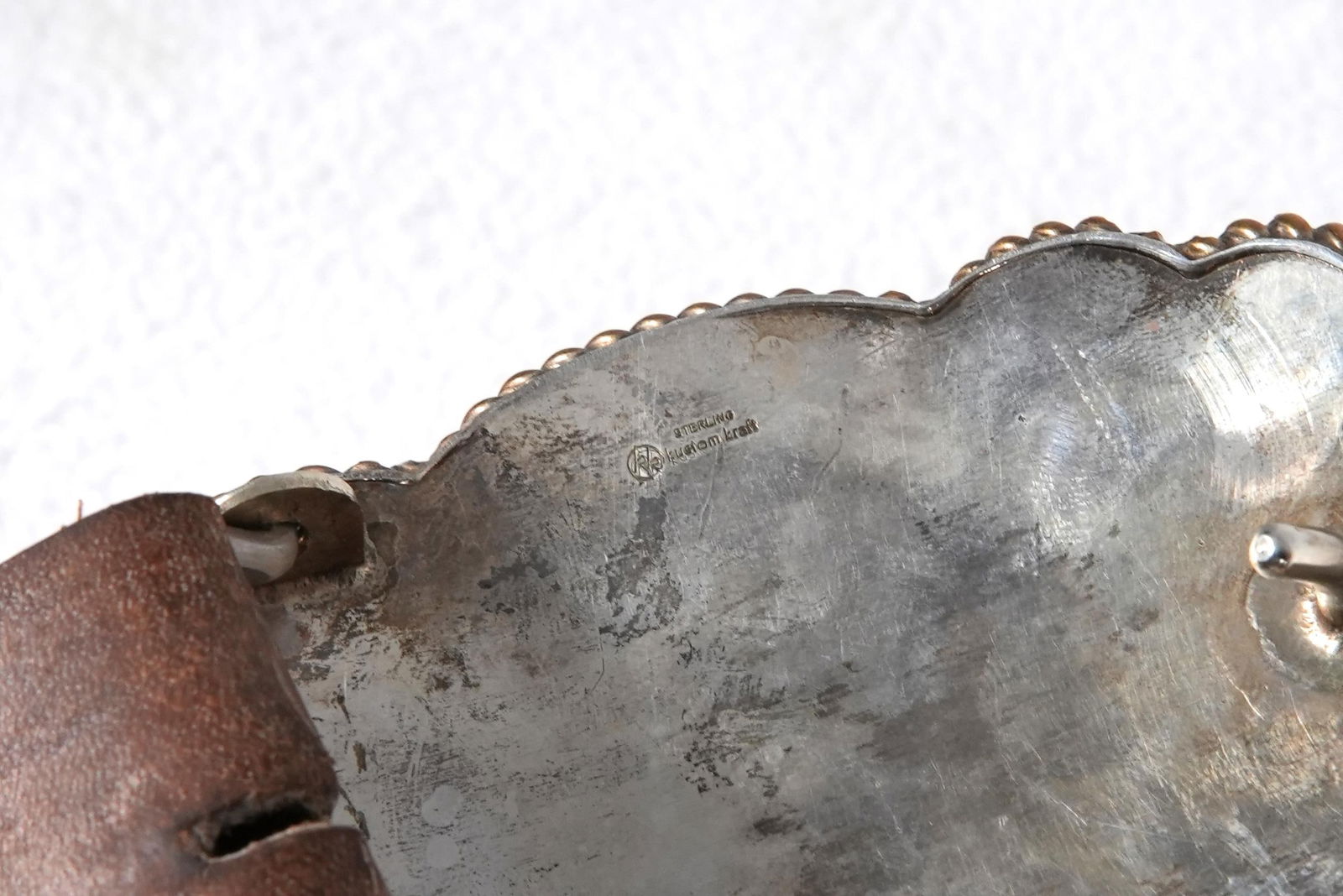 Three Sterling silver rodeo buckles - 9