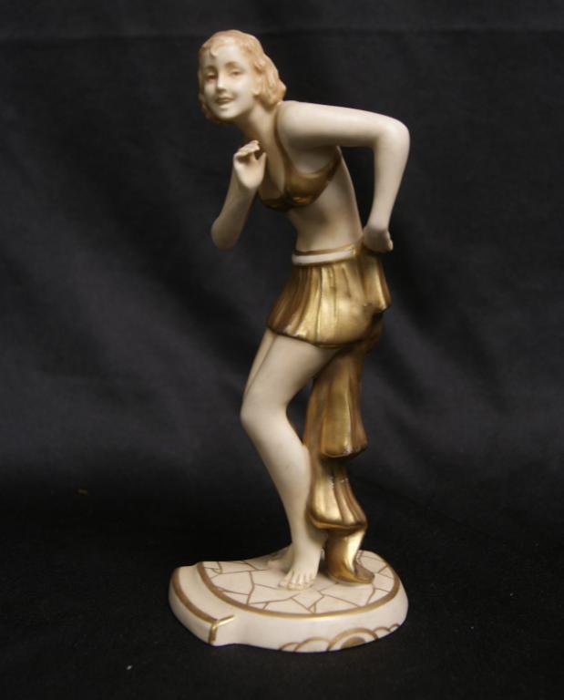 Royal Dux 7.4" bathing art nouveau girl: decorated in rustic white, pink and gilt bathing suit, the underside is marked with number 3338 pink Royal Dux Bohemia stamp, on tile like stand.