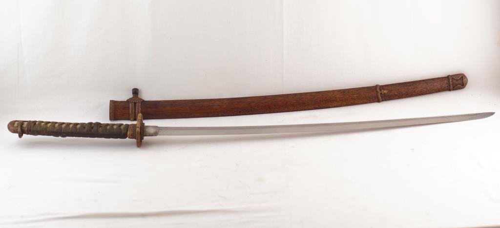 WWII Japanese Katana Shin Gunto signed WWII: wood scabbard with highly decorated bronze ornaments. Silver seal signature on pommel, Stingray handle, Old Blade