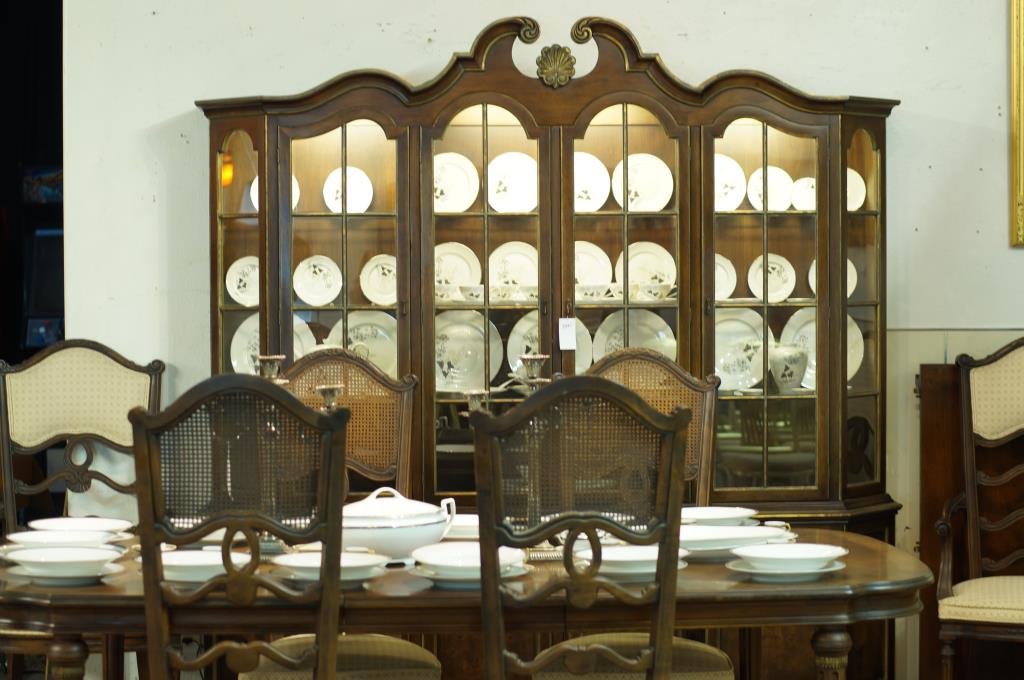 French Provincial walnut dining room set: table with two leaves, set 6 carved chairs with cane backs Carved Louis XVI china hutch - unusual set by "Daniel Jones" NYC: Provenance Florence Wilner purchased from the maker in NYC