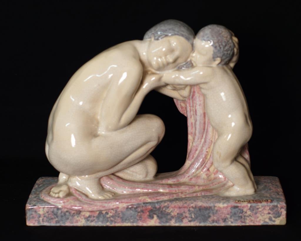 Pierre Traverse (1892 -1979) Ceramic Statue: signed Pierre Traverse Title: "Kvinna och barn" (Woman and Child) measures 17.25W x 13.5" H x 6.25" W - Ceramic with glaze