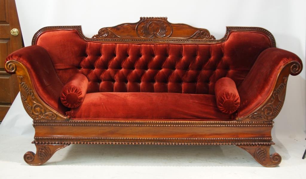Classic Duncan Phyfe style rolled arm sofa: wood carved trim in red upholstery
