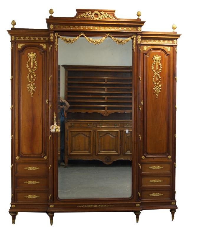 19th c. French Renaissance Revival wardrobe: Fine ormolu and large beveled mirror front center, and mirrored side-doors (on inside). Finely cast Gilt Bronze ormolu decorates panels, trim, feet and bonnet in a balanced placement - fancy gilt bron