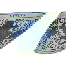 Ming Wanli Blue and White Basin with Lion - Playing - Ball Patterns: H:27cm W:35.5cm This Ming Wanli Blue and White Basin with Lion - Playing - Ball Patterns has a regular and magnificent shape. The body is painted with blue and white lion - playing - ball patterns, wi