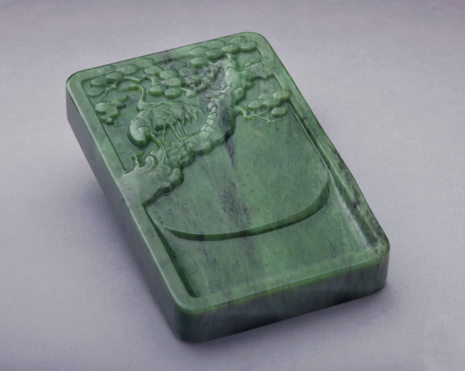A Spinach--Green Jade Inkstone with Pine and Cranes, 20th Century (1 of 4)
