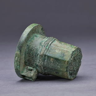 A Bronze Chariot Wheel Hub, Warring States to Han Dynasty: 战汉时期青铜车軎 来源：犹太人古董商 Outer D:9.1cm Inner D:5.3cm Length: 8.7cm 