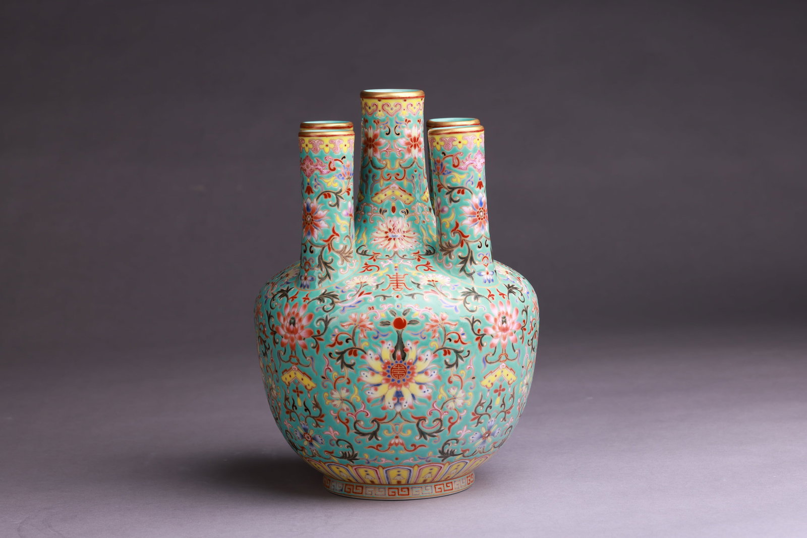 QING DYNASTY QIANLONG PERIOD A Turquoise-ground famille rose five-neck vase with lotus scroll and (1 of 7)