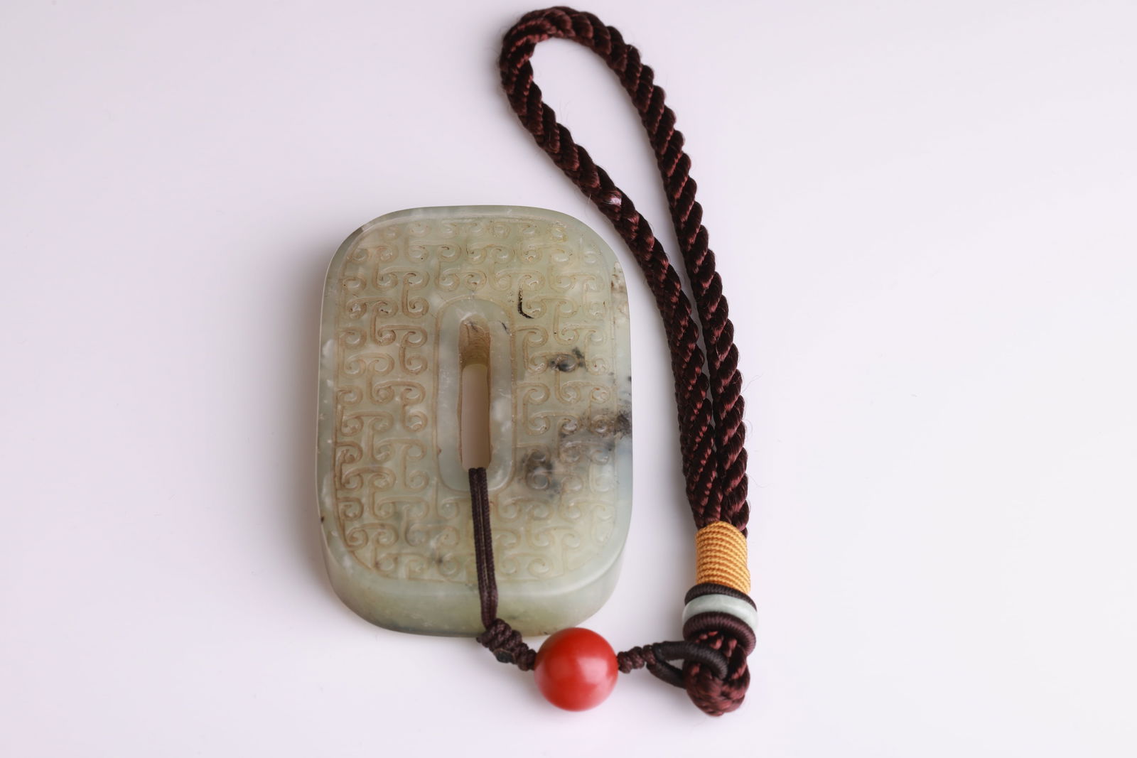 QING DYNASTY A Hetian Jade Sword Guard (1 of 2)