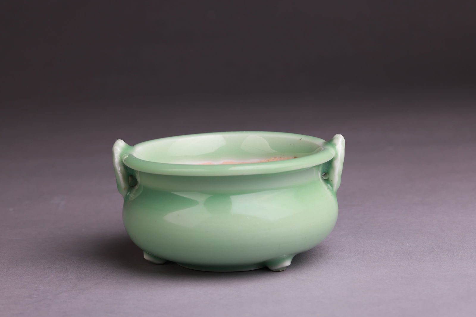 QING DYNASTY A Celadon-Green Glazed Double-Handled Censer (1 of 2)