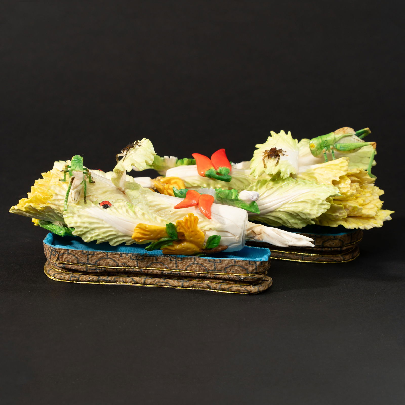 A FINE AND RARE PAIR OF BONE-CARVED AND POLYCHROME 'CABBAGE AND INSECTS' ORNAMENTS 20TH CENTURY (1 of 3)