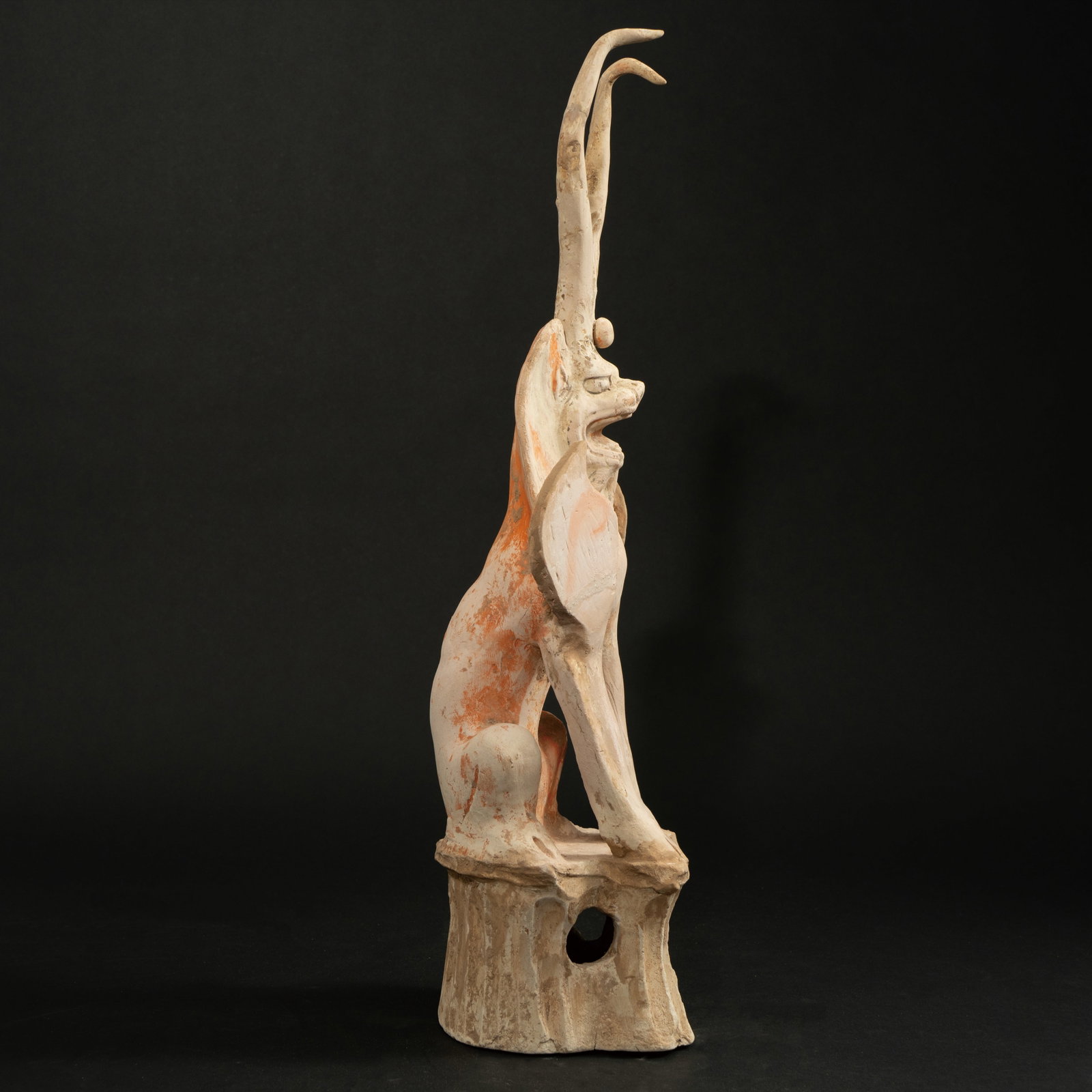 A RARE AND DYNAMIC PAINTED POTTERY FIGURE OF AN EARTH SPIRIT (ZHENMU SHOU) TANG DYNASTY (618–: A RARE AND DYNAMIC PAINTED POTTERY FIGURE OF AN EARTH SPIRIT (ZHENMU SHOU)TANG DYNASTY (618–907)唐代 彩绘陶镇墓兽ESTIMATE: $4,000 – $6,000De